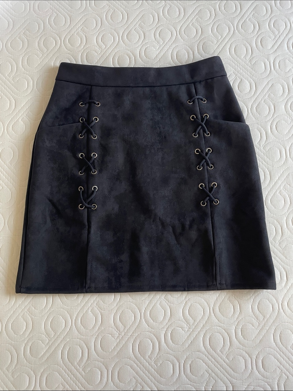 Black faux suede with silver grommet Mini skirt with pockets